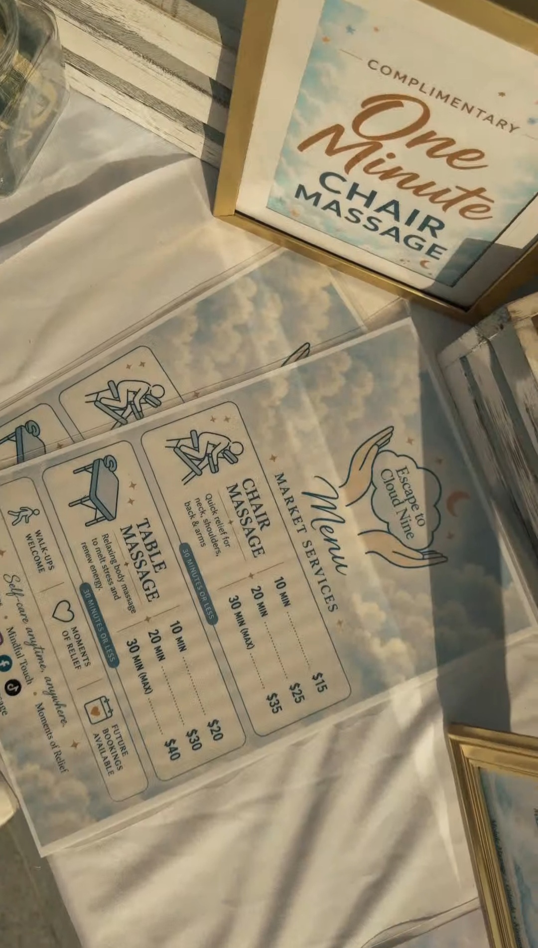 Two clear plastic cards with service details, placed on a white surface, with a box in the background.
