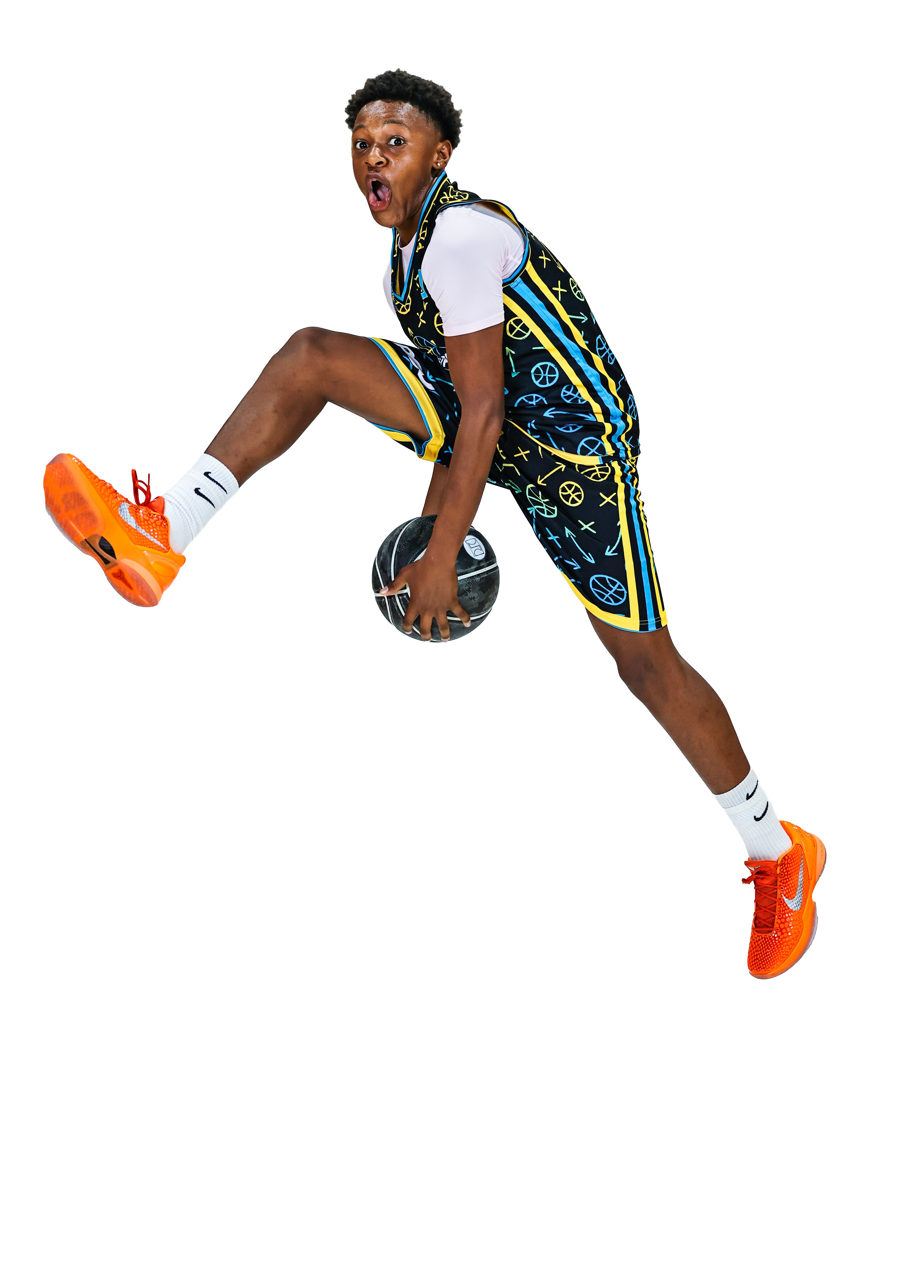 Young person jumping with a boombox, wearing sportswear and orange sneakers, mid-air pose, white background.