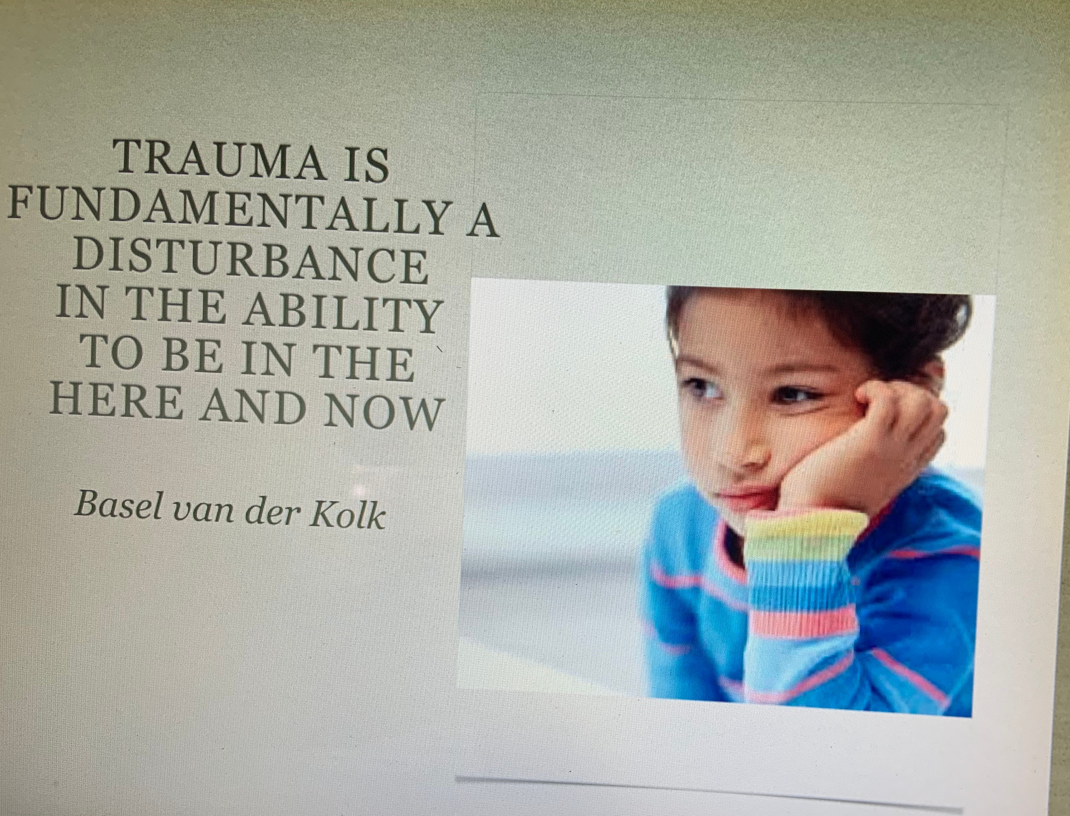 Quote about trauma and ability to be present, with a photo of a young boy resting his face on his hand, wearing a colorful striped shirt.