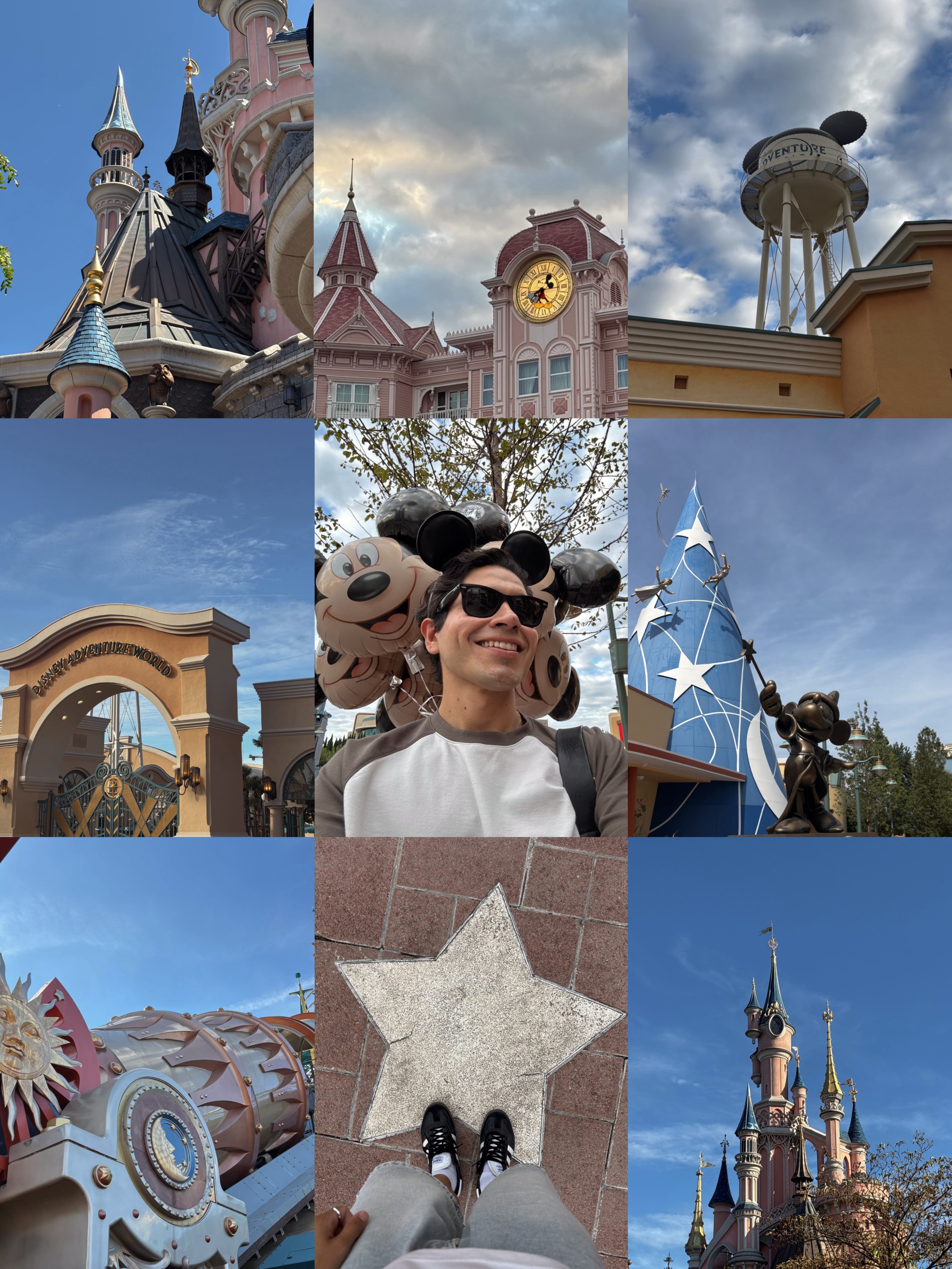 People at a theme park with castle, rides, and a person with plush toys, smiling, standing on a star-shaped pavement.
