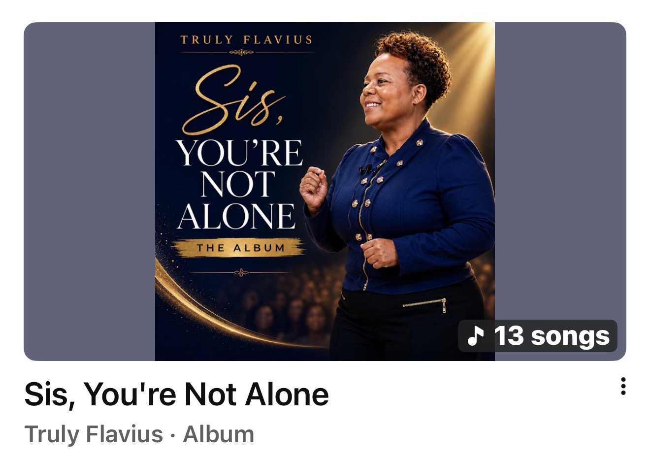 Album cover featuring a smiling woman in a blue outfit, with text 'Sis, You're Not Alone' and 'The Album'.